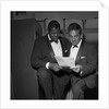 Oscar Peterson with an unknown man by Harry Hammond