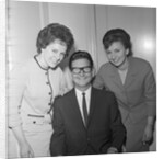 Roy Orbison posing with two fans by Harry Hammond