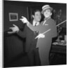 Anthony Newley with cardboard cut-out of himself by Harry Hammond