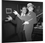 Anthony Newley with cardboard cut-out of himself by Harry Hammond