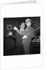 Anthony Newley with cardboard cut-out of himself by Harry Hammond