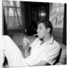 Jerry Lewis relaxing with a cigarette by Harry Hammond