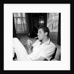 Jerry Lewis relaxing with a cigarette by Harry Hammond
