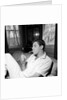 Jerry Lewis relaxing with a cigarette by Harry Hammond