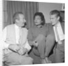 Eartha Kitt with two unnamed men by Harry Hammond