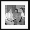 Eartha Kitt with two unnamed men by Harry Hammond