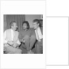 Eartha Kitt with two unnamed men by Harry Hammond
