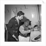 Sister Rosetta Tharp with unknown man in her dressing room by Harry Hammond