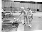Shani Wallis with Vera Day in a swimming pool by Harry Hammond