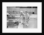 Shani Wallis with Vera Day in a swimming pool by Harry Hammond