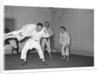 Peter Sellers having Judo lessons by Harry Hammond