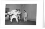 Peter Sellers having Judo lessons by Harry Hammond