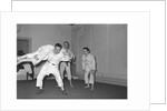 Peter Sellers having Judo lessons by Harry Hammond