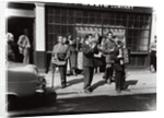 Danny Purches with a group of people by Harry Hammond