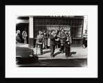 Danny Purches with a group of people by Harry Hammond