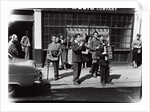 Danny Purches with a group of people by Harry Hammond