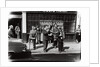 Danny Purches with a group of people by Harry Hammond