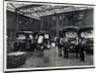 Loading up new matresses for delivery in the yard of Torrington Place by Unknown