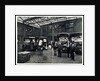 Loading up new matresses for delivery in the yard of Torrington Place by Unknown