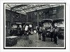 Loading up new matresses for delivery in the yard of Torrington Place by Unknown