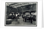 Loading up new matresses for delivery in the yard of Torrington Place by Unknown