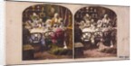 Group at dining table by James Elliot