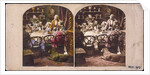 Group at dining table by James Elliot