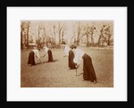 Four ladies playing hockey by Andrew Pitcairn-Knowles