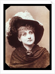 Maude Branscombe wearing a feather-plumed hat by Elliott & Fry