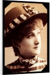 Maude Branscombe wearing a straw hat and matching dress by Unknown