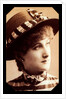 Maude Branscombe wearing a straw hat and matching dress by Unknown