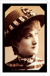 Maude Branscombe wearing a straw hat and matching dress by Unknown