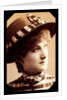 Maude Branscombe wearing a straw hat and matching dress by Unknown
