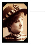 Maude Branscombe wearing a straw hat and matching dress by Unknown