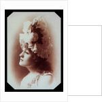 Belle Bilton wearing an ornate hat by Alexander Bassano