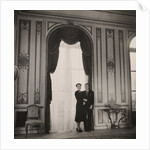 The Duke and Duchess of Windsor posing against a large window by Cecil Beaton