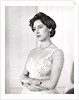 Princess Margaret in a formal one-shouldered evening dress by Cecil Beaton