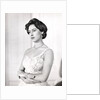 Princess Margaret in a formal one-shouldered evening dress by Cecil Beaton