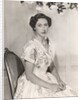 Princess Margaret sitting on a chair by Cecil Beaton
