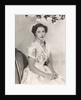 Princess Margaret sitting on a chair by Cecil Beaton