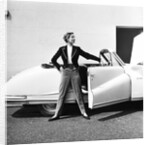Model beside open door of Austin of England A90 Atlantic Sports saloon convertible by Elsbeth Juda