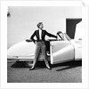 Model beside open door of Austin of England A90 Atlantic Sports saloon convertible by Elsbeth Juda