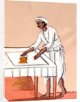 A dhobi ironing by Unknown