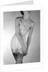 Model wearing girdle with suspender belt by John French