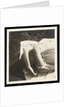 Woman wearing striped t-shirt lying on rug with both arms covering face by Curtis Moffat
