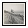 Man jumping off sand dune by Curtis Moffat