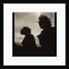 Silhouette of two women hair blown by wind sitting in wooden boat by Curtis Moffat
