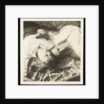 Man and woman lying head by head on rug on grass by Curtis Moffat
