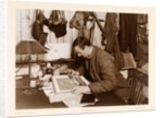 Dr. Edward Adrian Wilson colouring a sketch by Herbert George Ponting