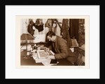 Dr. Edward Adrian Wilson colouring a sketch by Herbert George Ponting
